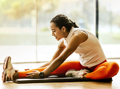 Focused woman practicing yoga with serene concentration.”