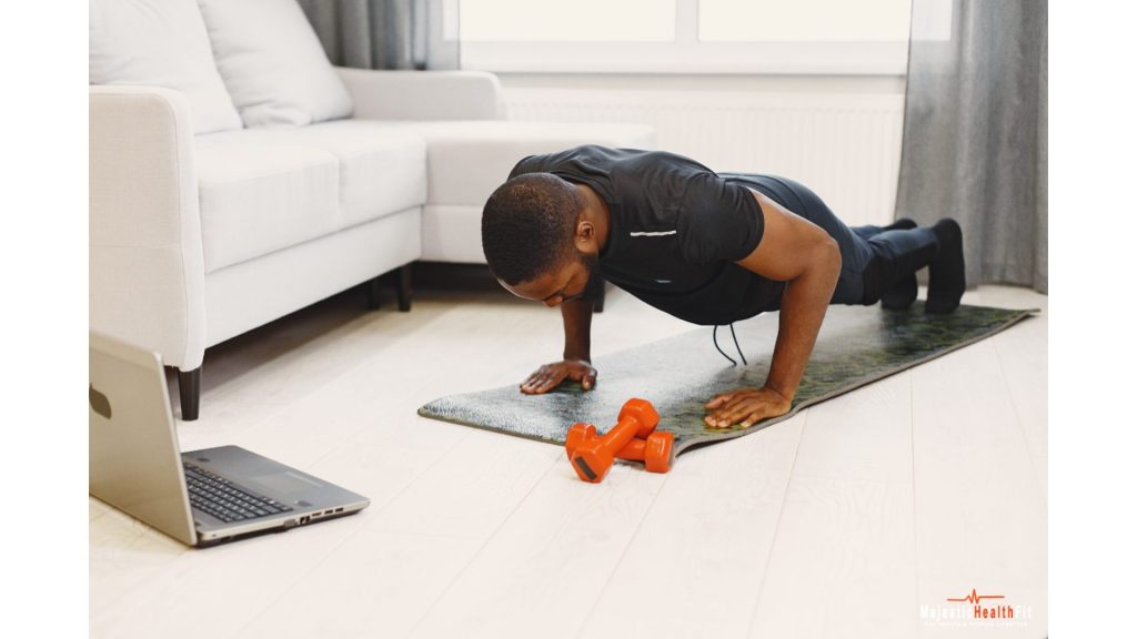 Man performing a no-equipment workout on an exercise mat at home, part of a no-equipment home workout for men.