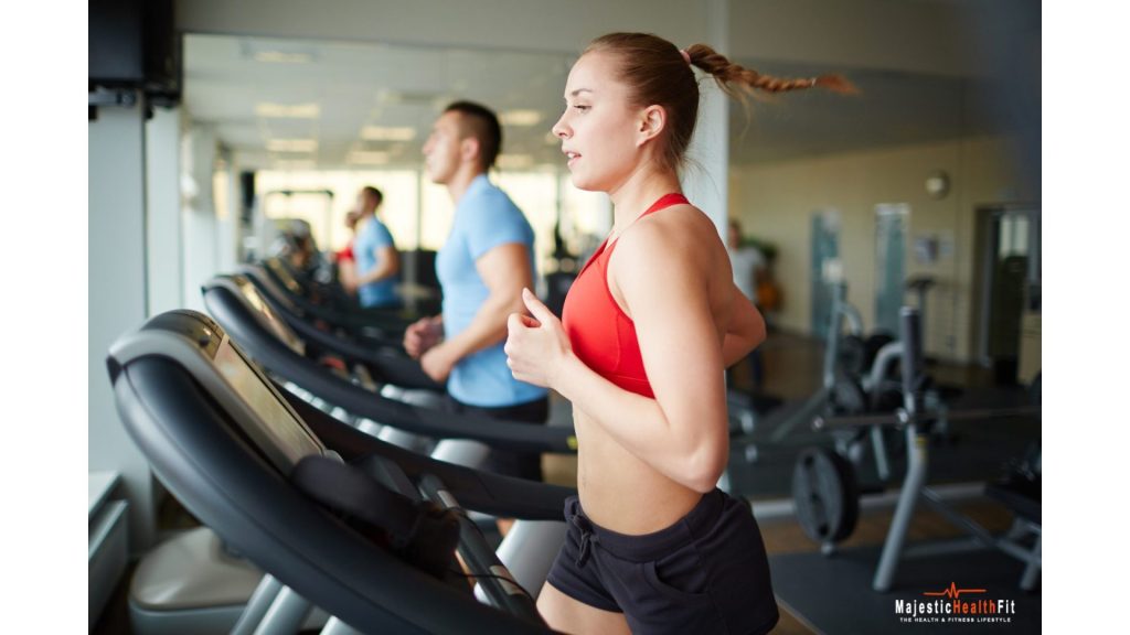 Woman running on a treadmill for cardio training"